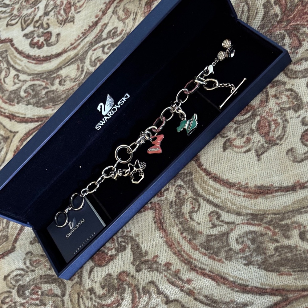 SWAROVSKI Disney/Minnie Mouse Colored Enamel & Crystal Toggle Charm Bracelet.